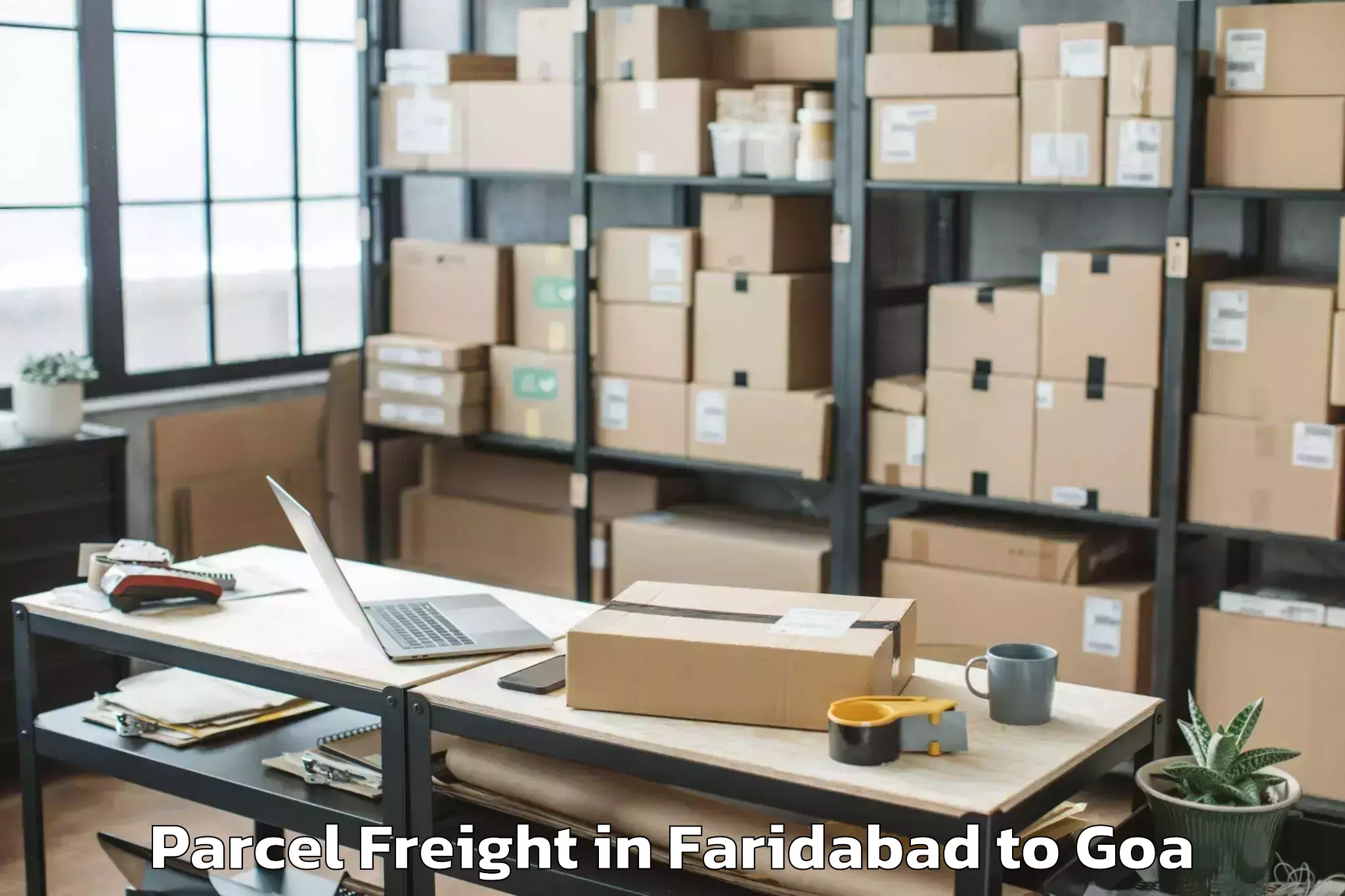 Book Faridabad to Chandor Parcel Freight